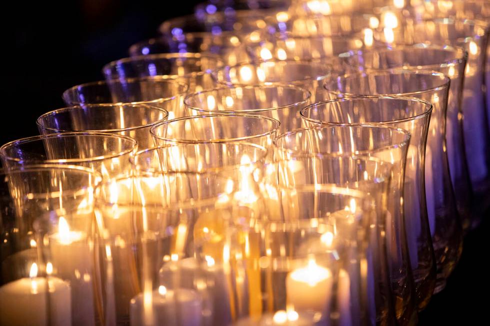 Fifty-eight candles are lit to remember each of the victims who perished during the events of O ...