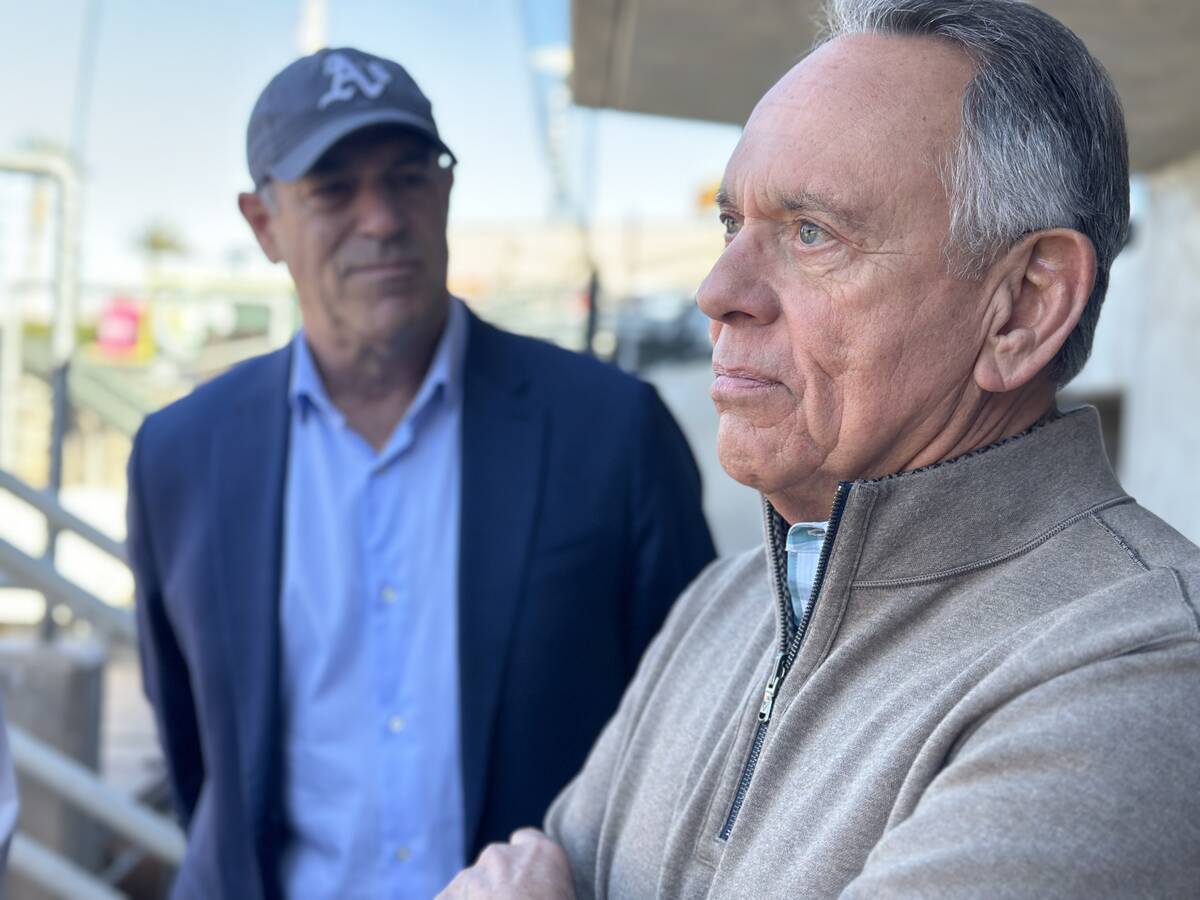 Clark County Commissioner Jim Gibson (right) and Athletics owner John Fisher having a conversat ...