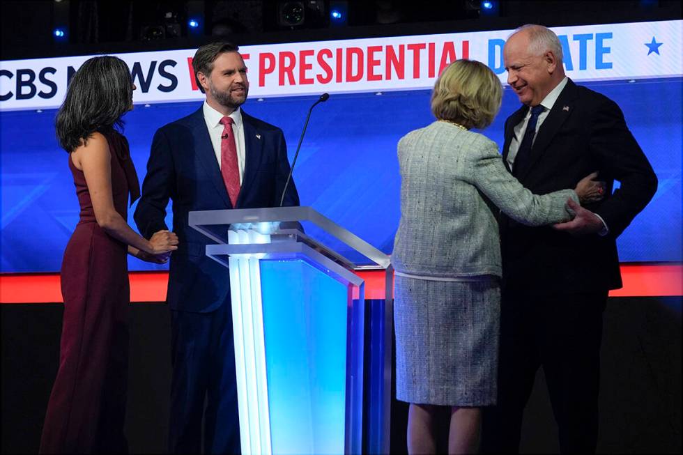 Republican vice presidential nominee Sen. JD Vance, R-Ohio, and his wife Usha Vance and and Dem ...