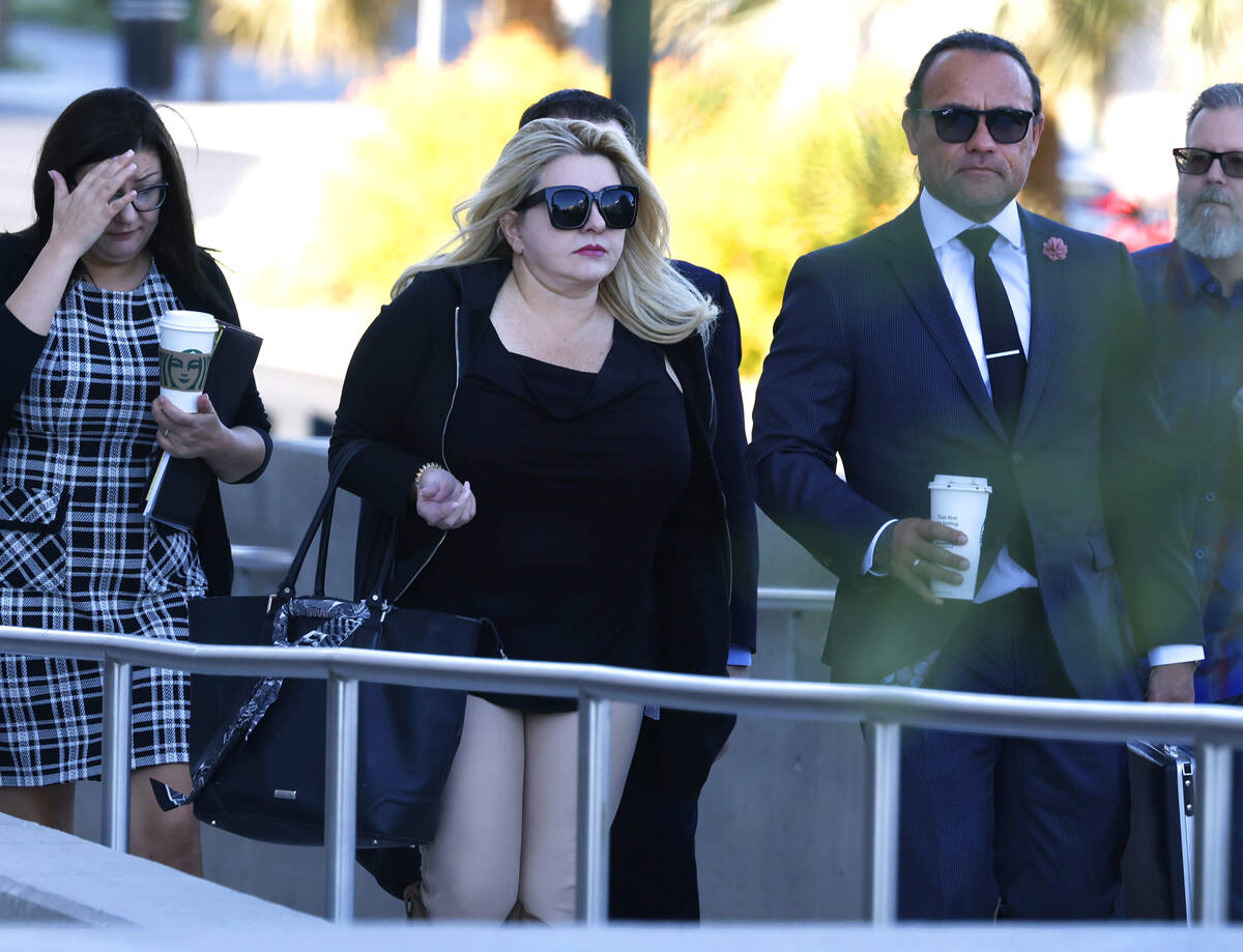 Former Las Vegas City Councilwoman Michele Fiore, center, arrives for her wire fraud trial at t ...