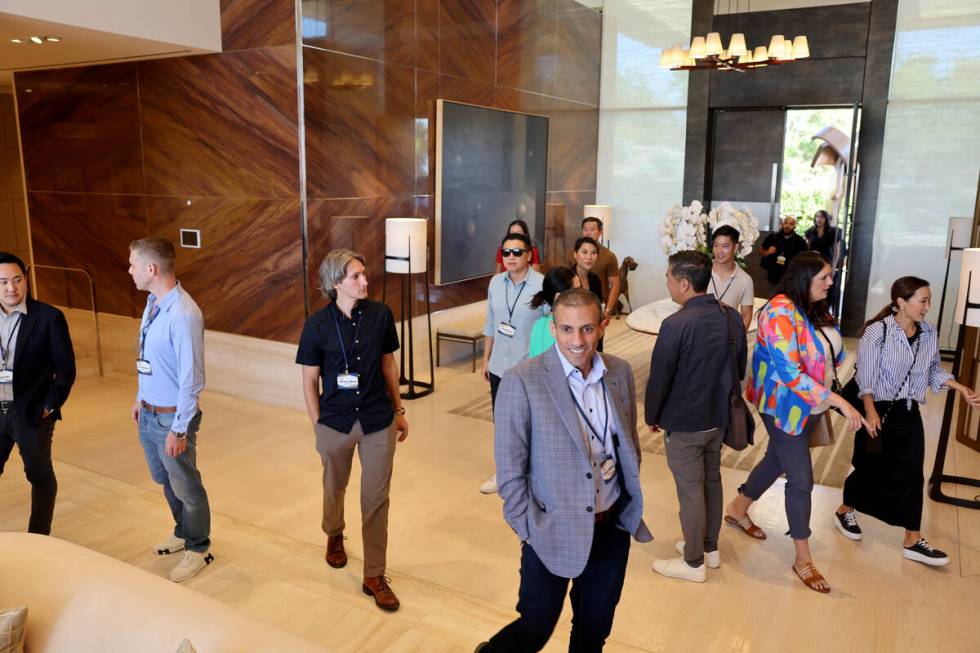 Tech entrepreneurs, CEOs and company founders mingle at Vegas Tech Summit at a home in the Summ ...