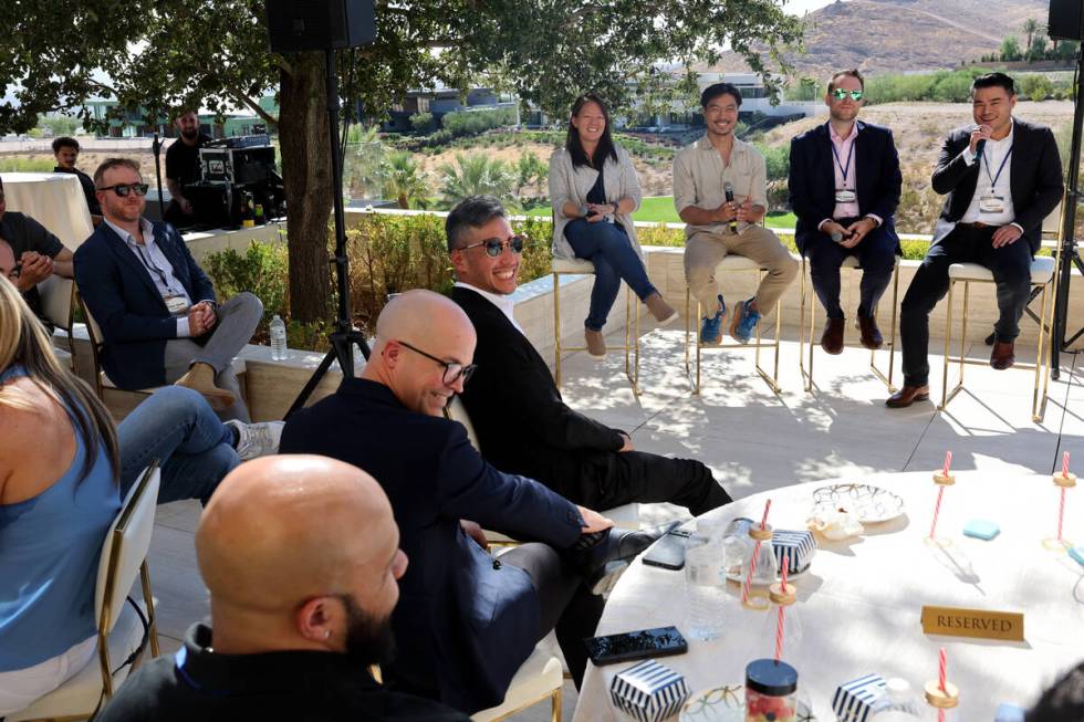 Tech entrepreneurs, CEOs and company founders listen to panelists, from left, Linda Tong, CEO a ...