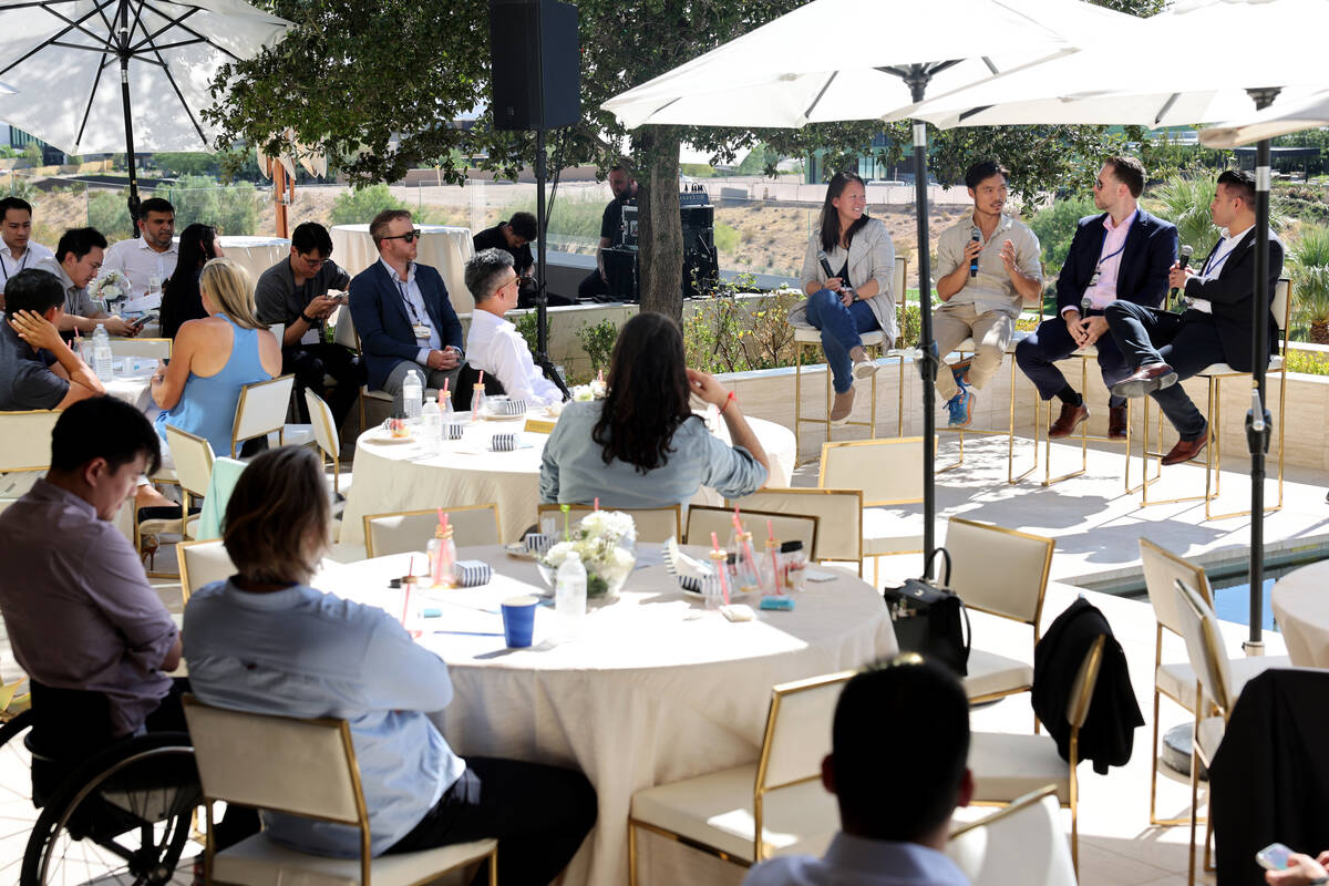 Tech entrepreneurs, CEOs and company founders listen to panelists, from left, Linda Tong, CEO a ...