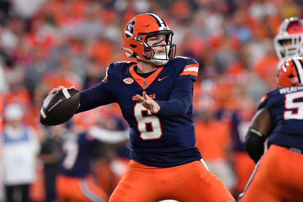 Syracuse quarterback Kyle McCord (6) throws during the first half of an NCAA football game agai ...