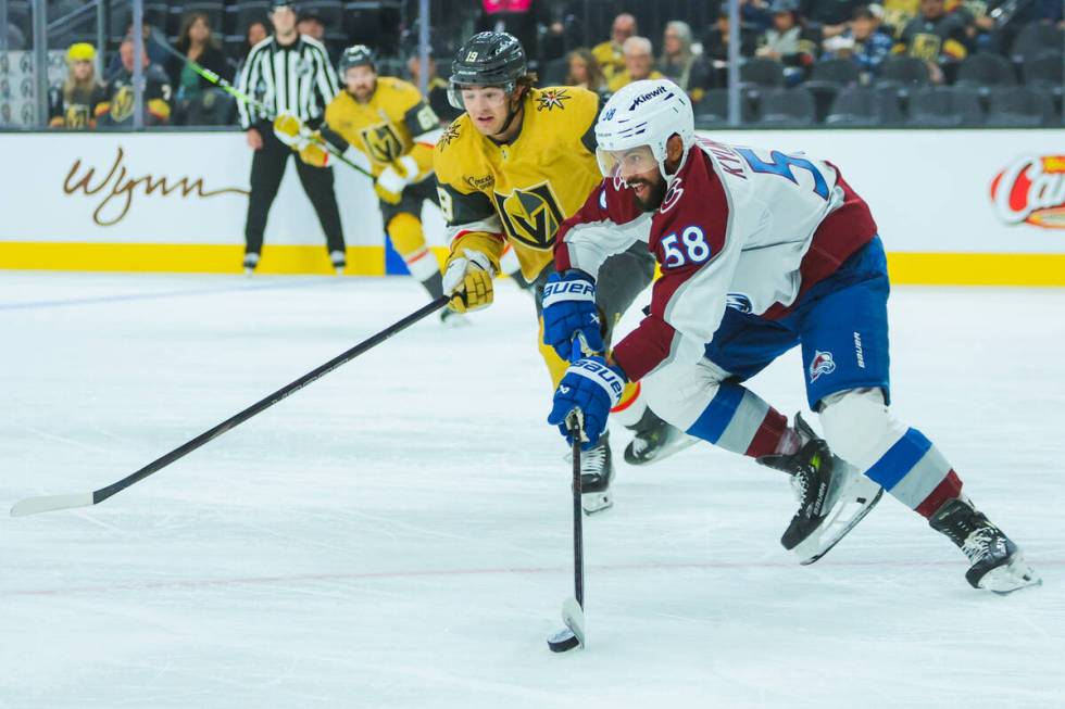 Golden Knights center Brendan Brisson (19) trails Colorado Avalanche defenseman Oliver Kylingto ...