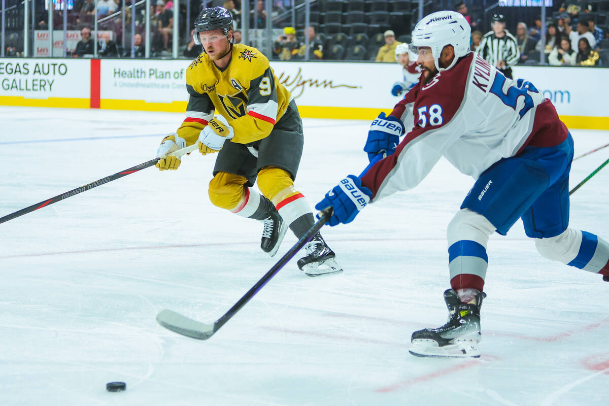 Golden Knights center Jack Eichel (9) closes in on the puck as Colorado Avalanche defenseman Ol ...