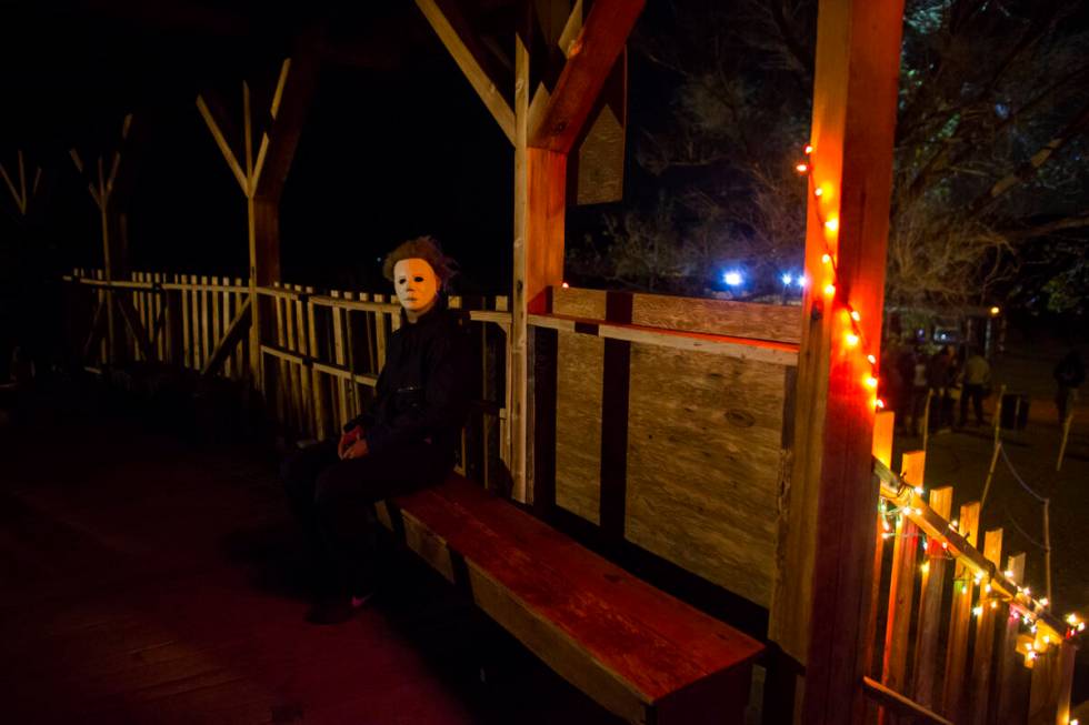 A costumed actor waits to scare visitors during "Bonnie Screams" at Bonnie Springs Ranch outsid ...