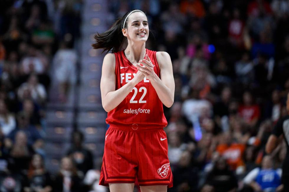 Indiana Fever guard Caitlin Clark (22) reacts during a first-round WNBA basketball playoff game ...