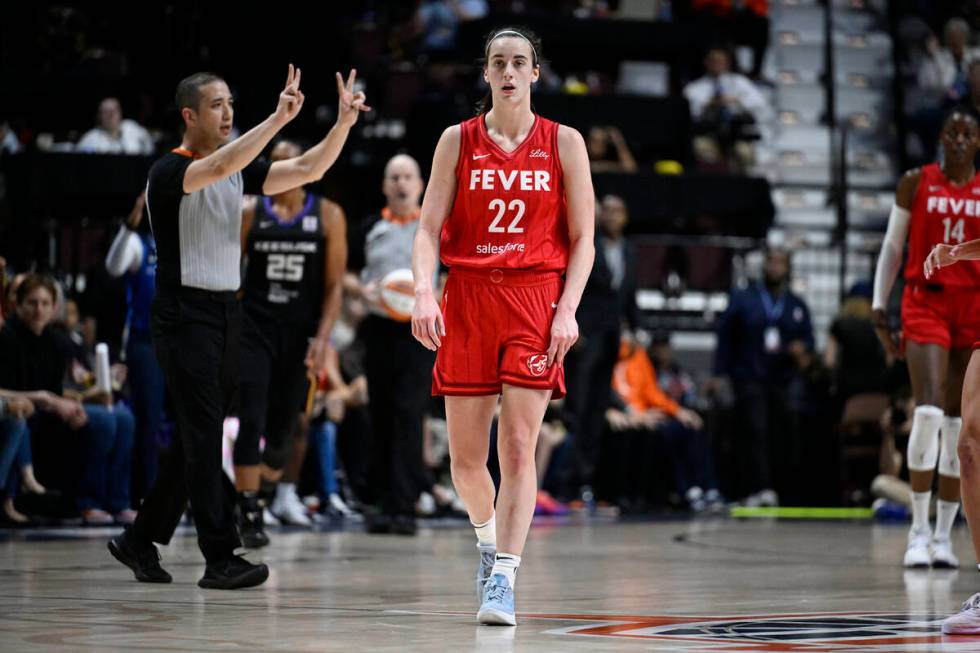 Indiana Fever guard Caitlin Clark (22) receives a delay of game warning during the second half ...