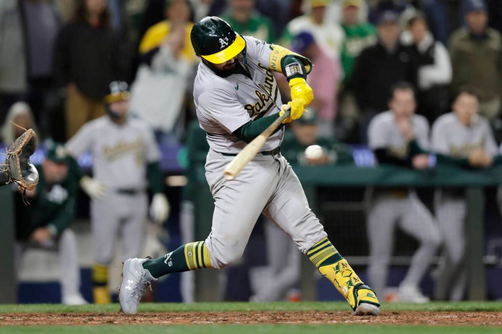 Oakland Athletics' Shea Langeliers hits a three-run home run on a pitch from Seattle Mariners p ...