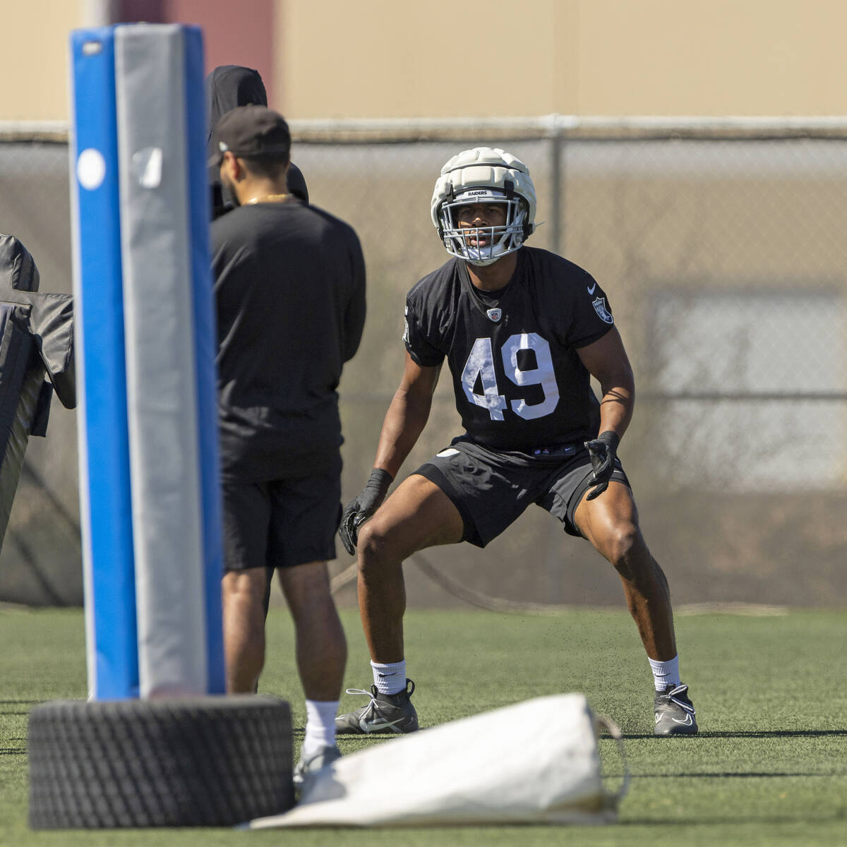 Raiders defensive end Charles Snowden (49) goes through a drill in practice at the Intermountai ...