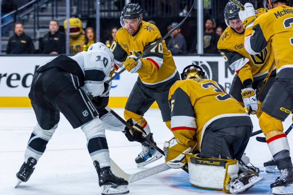 Golden Knights forward Tanner Pearson (70) charges in to defend Golden Knights goaltender Ilya ...