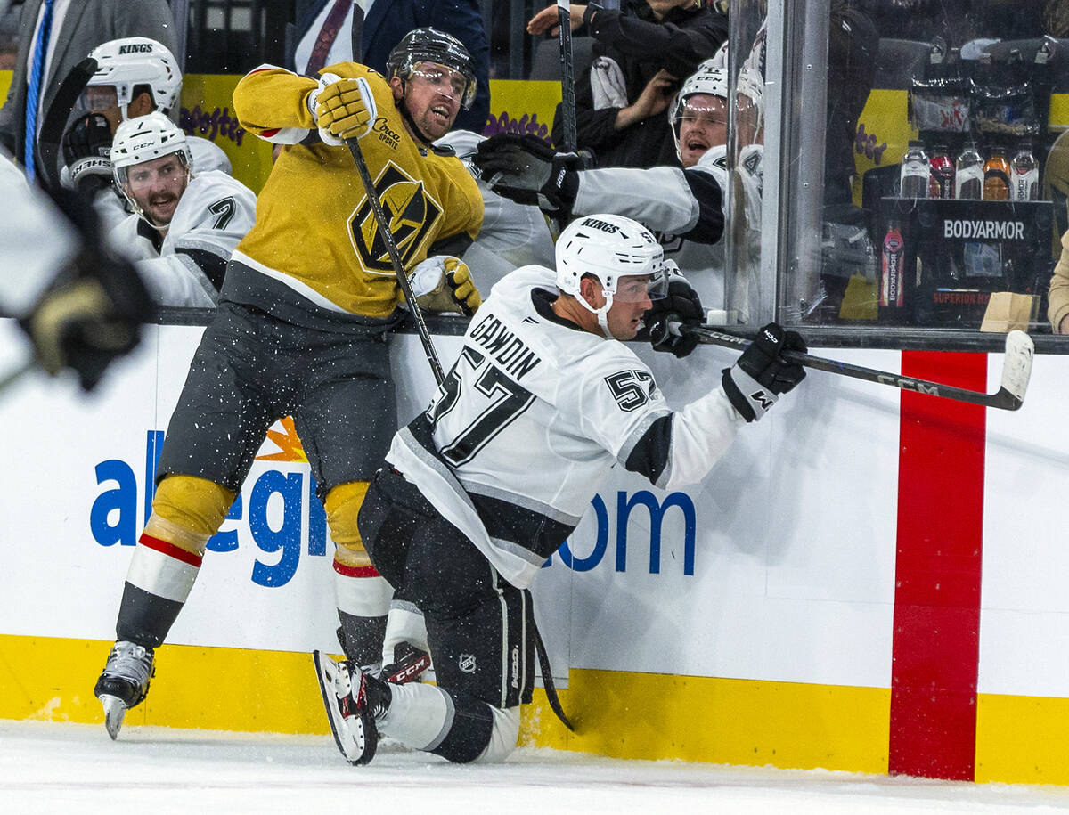 Golden Knights forward Tanner Pearson (70) collides with Los Angeles Kings center Glenn Gawdin ...