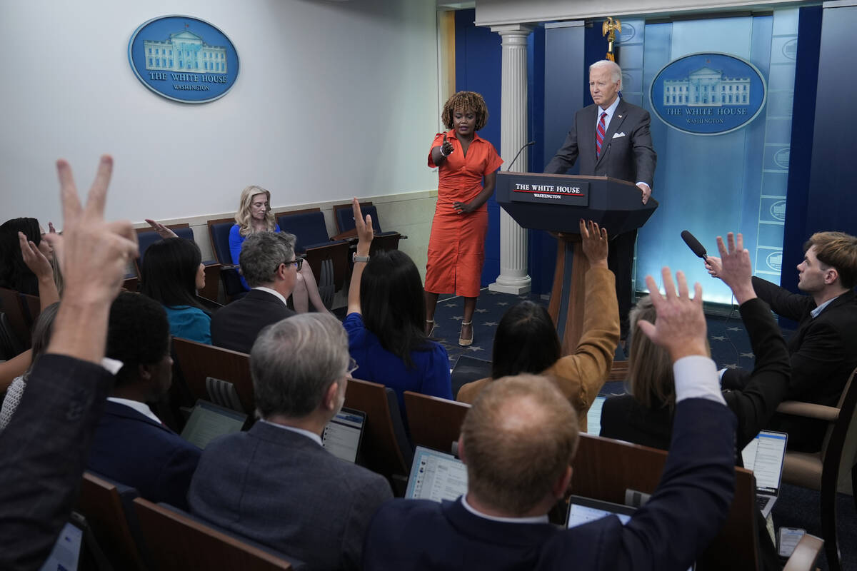 White House press secretary Karine Jean-Pierre calls on a reporter as President Joe Biden makes ...