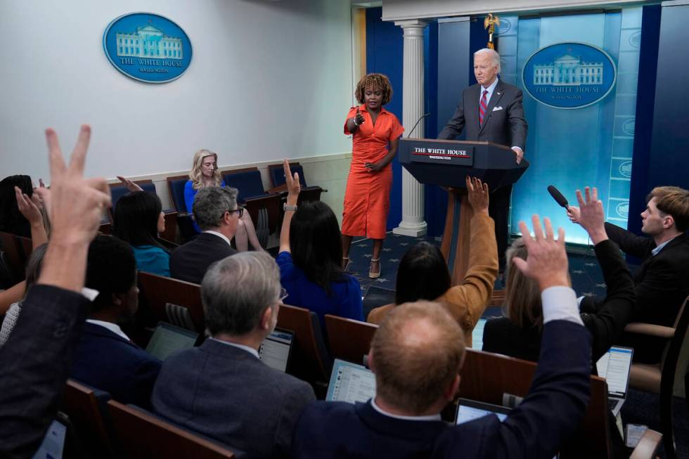 White House press secretary Karine Jean-Pierre calls on a reporter as President Joe Biden makes ...