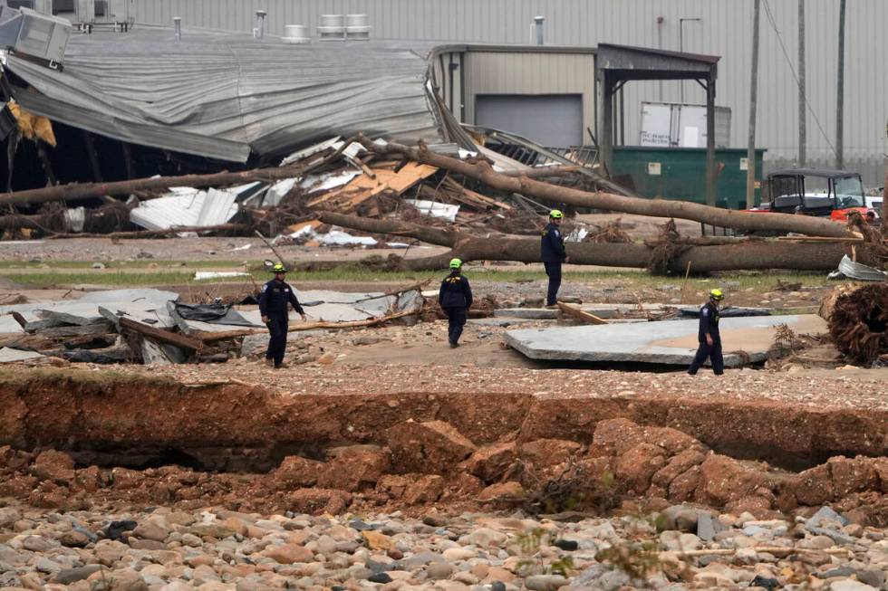 Personnel from Urban Search and Rescue Utah Task Force 1 work in the aftermath of Hurricane Hel ...