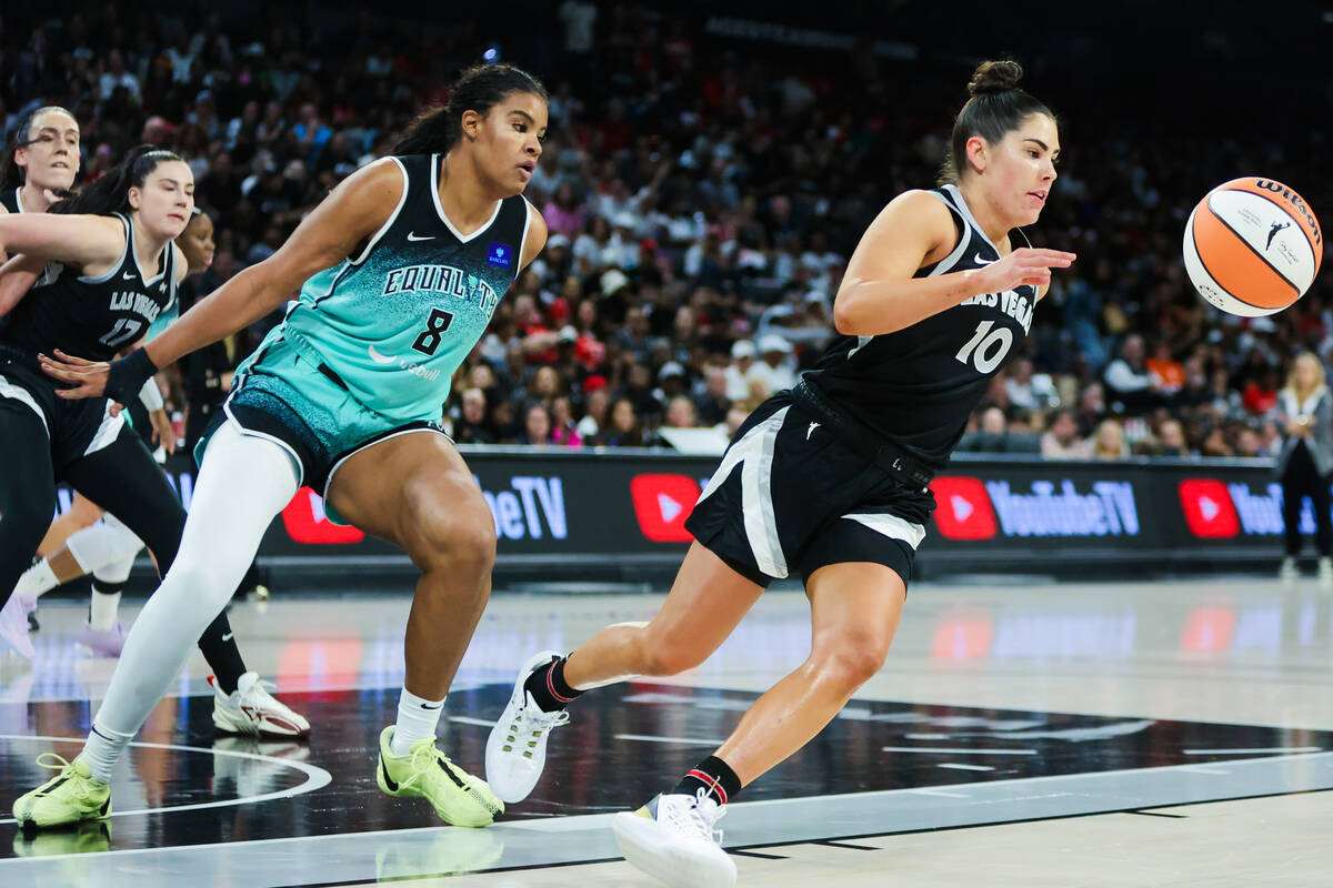 Aces guard Kelsey Plum (10) chases after the ball as New York Liberty forward Nyara Sabally (8) ...