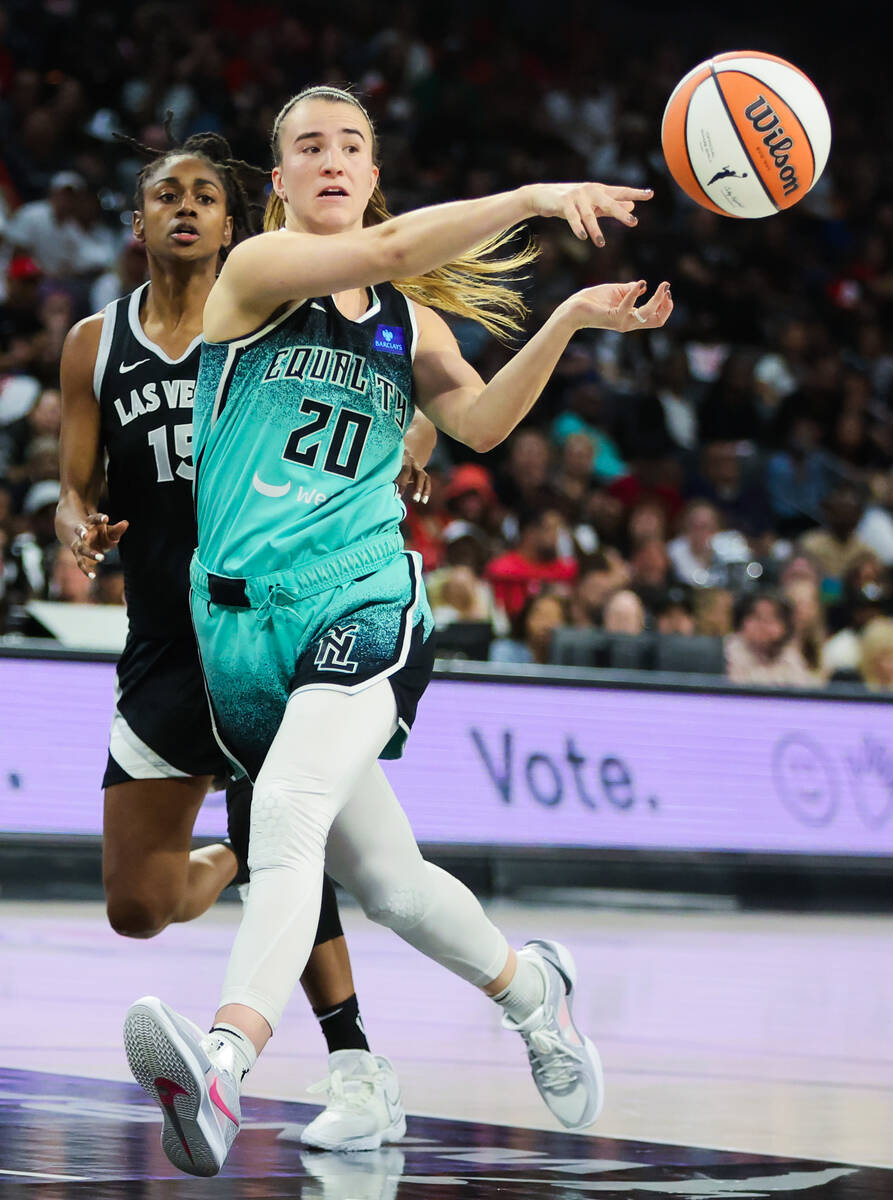 New York Liberty guard Sabrina Ionescu (20) passes the ball to a teammate during game three of ...