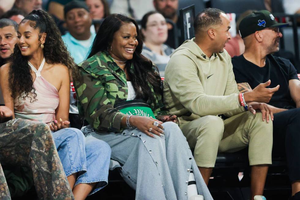 WNBA legend Sheryl Swoopes laughs during game three of a WNBA semifinals playoff game between t ...