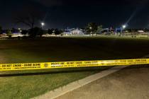 Crime scene tape is seen at Lewis Family Park in the east Las Vegas Valley, where the Metropoli ...