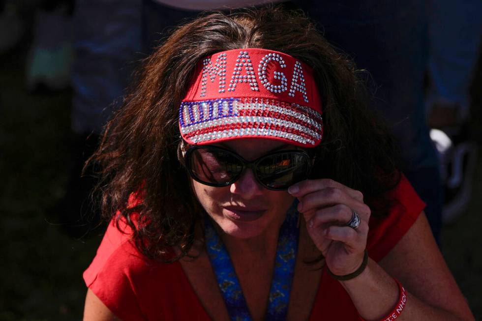 A supporter arrives before Republican presidential nominee former President Donald Trump speaks ...