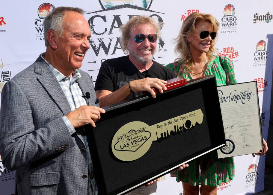 Clark County Commissioner Jim Gibson, left, gives Sammy Hagar a Key to the Las Vegas Strip as H ...