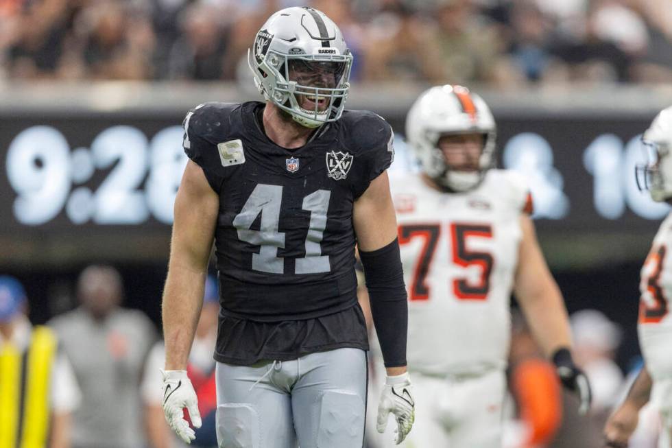 Raiders linebacker Robert Spillane (41) smiles on the field during the first half of an NFL gam ...