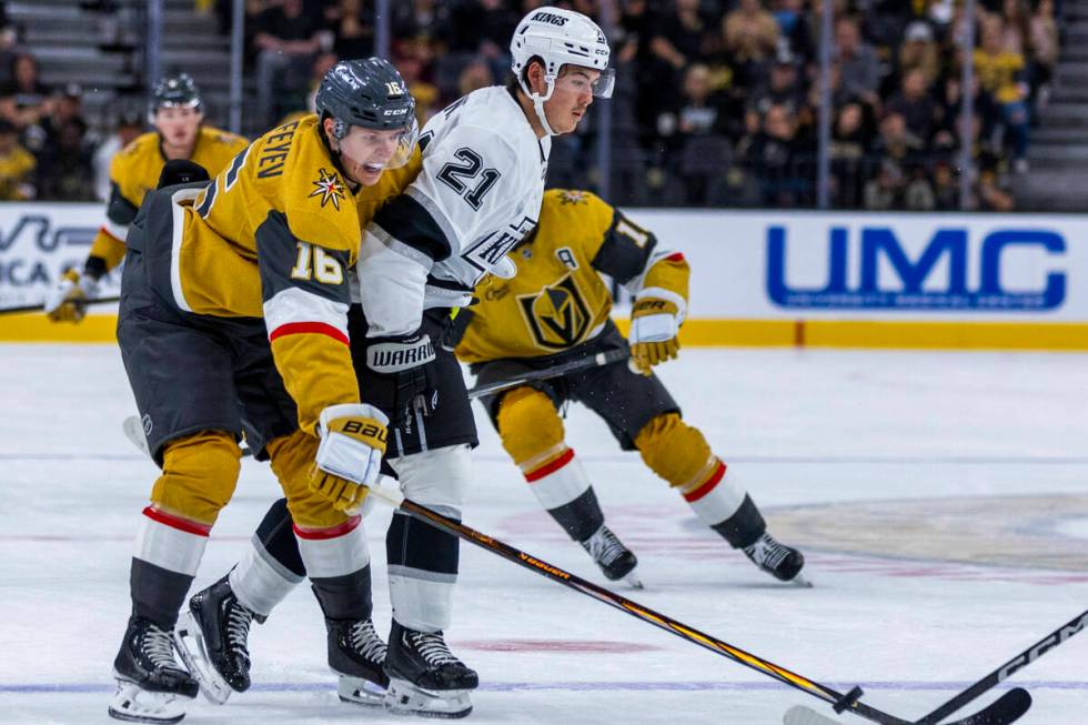 Golden Knights left wing Pavel Dorofeyev (16) works to keep a puck from Los Angeles Kings defen ...