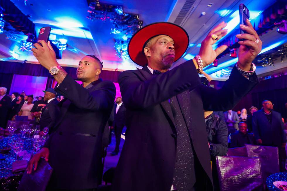 Nas, left, records next to Grandmaster Caz during the Paid in Full Foundation’s Hip Hop ...