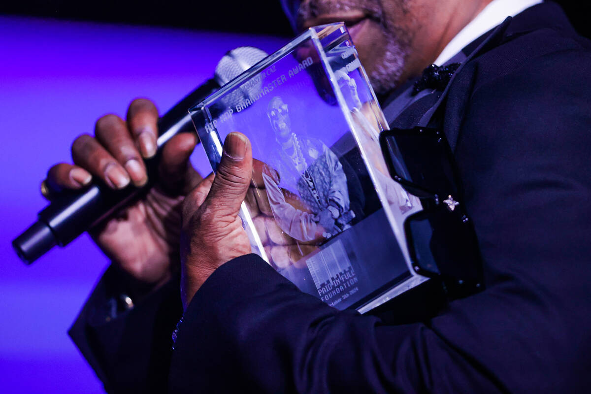 Grandmaster Caz holds his award during the Paid in Full Foundation’s Hip Hop Grandmaster ...