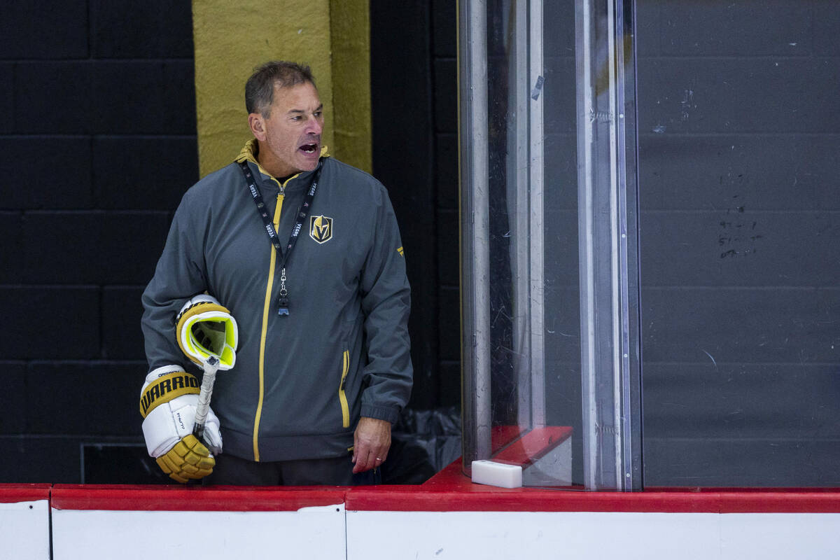 Golden Knights Head Coach Bruce Cassidy yells instructions to his players during training camp ...