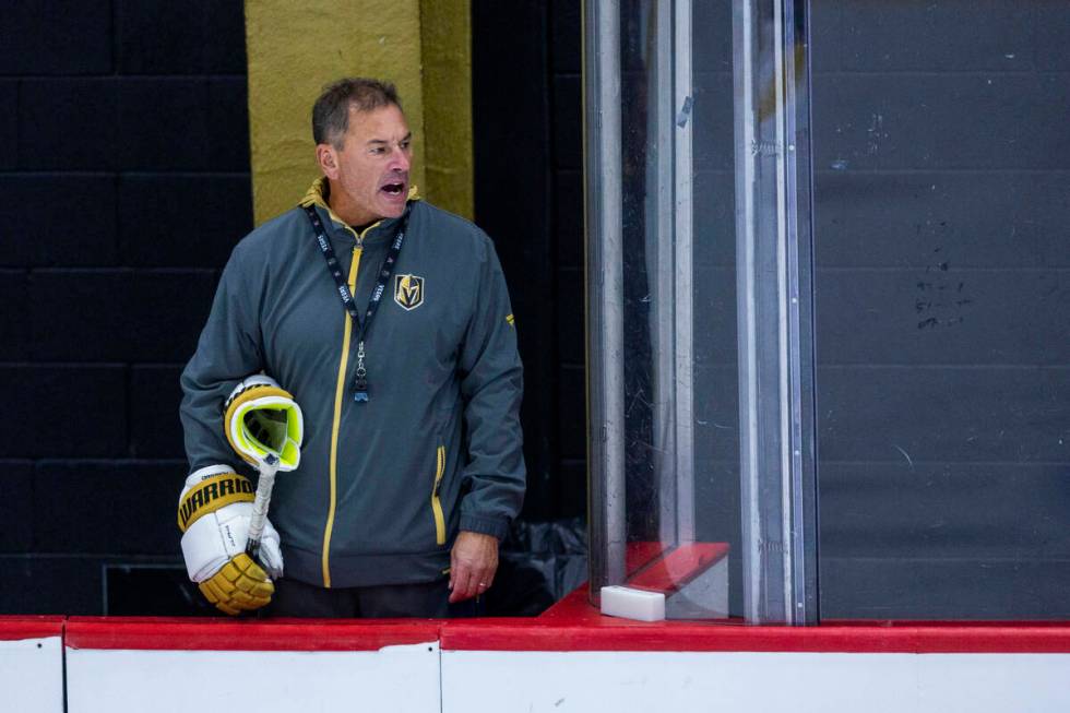 Golden Knights Head Coach Bruce Cassidy yells instructions to his players during training camp ...