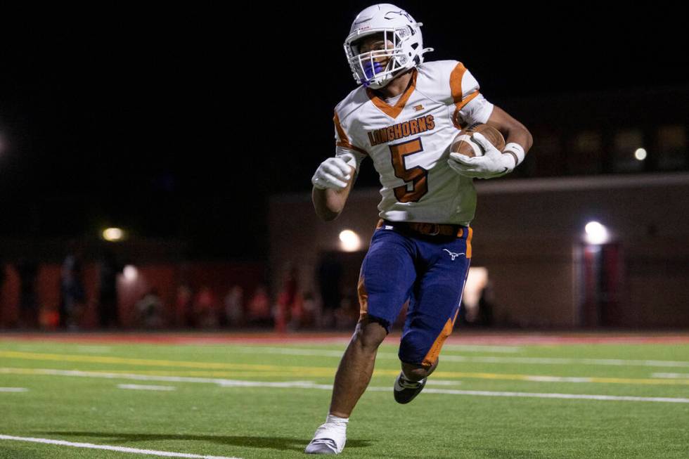 Legacy halfback Zaione Henderson (5) runs with the ball during the Class 5A high school &#x2018 ...