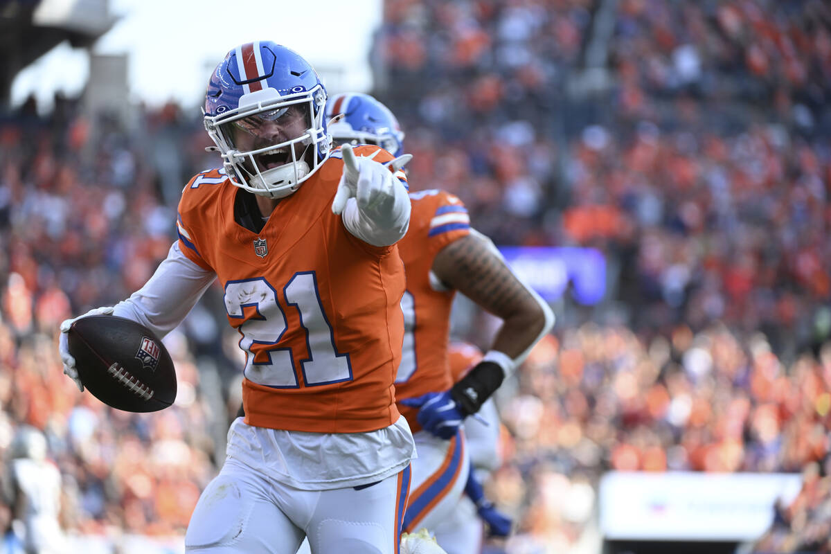 Denver Broncos cornerback Riley Moss (21) reacts after his interception intended for Las Vegas ...