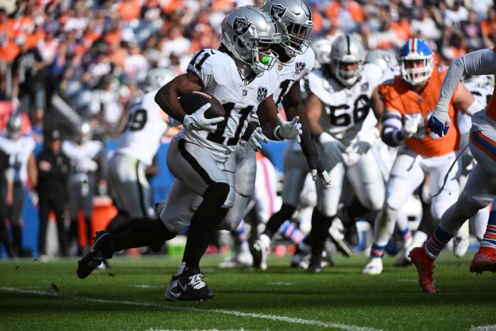 Las Vegas Raiders wide receiver Tre Tucker (11) runs during the second half of an NFL football ...