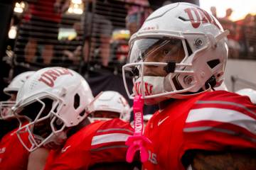 UNLV players wait to exit the tunnel before the college football game against the Syracuse Oran ...