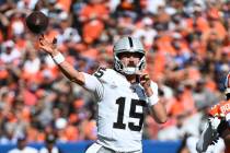 Las Vegas Raiders quarterback Gardner Minshew throws during the first half of an NFL football g ...