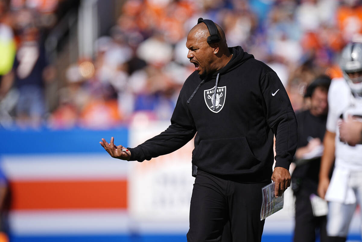 Las Vegas Raiders head coach Antonio Pierce reacts on the sideline during the first half of an ...