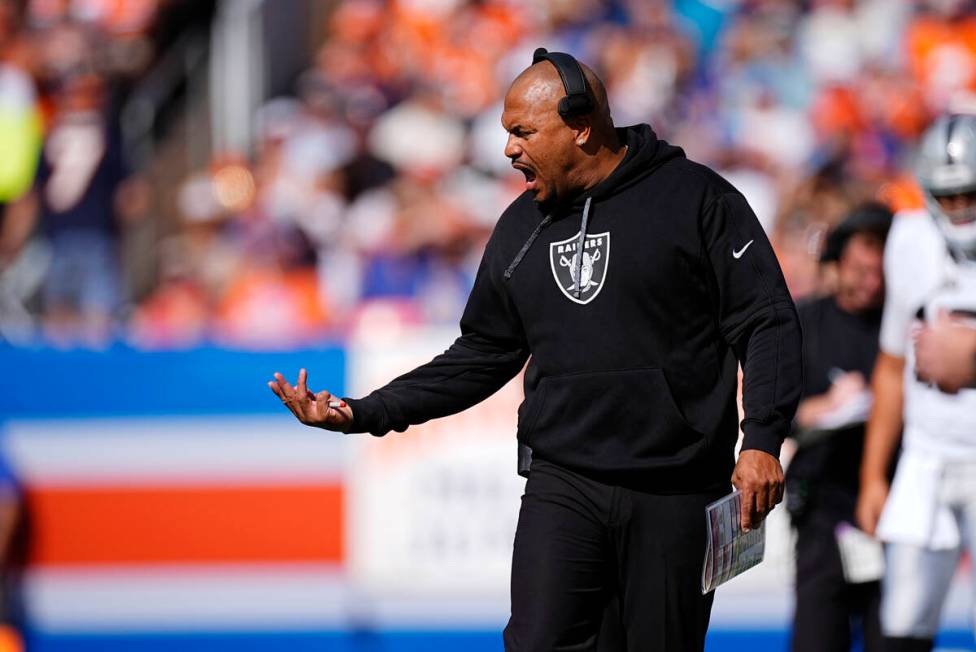 Las Vegas Raiders head coach Antonio Pierce reacts on the sideline during the first half of an ...