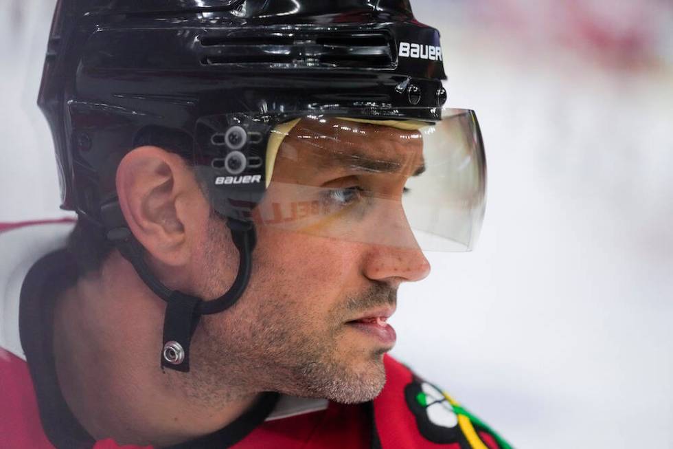 Chicago Blackhawks defenseman Alec Martinez warms up before an NHL hockey game against the Detr ...