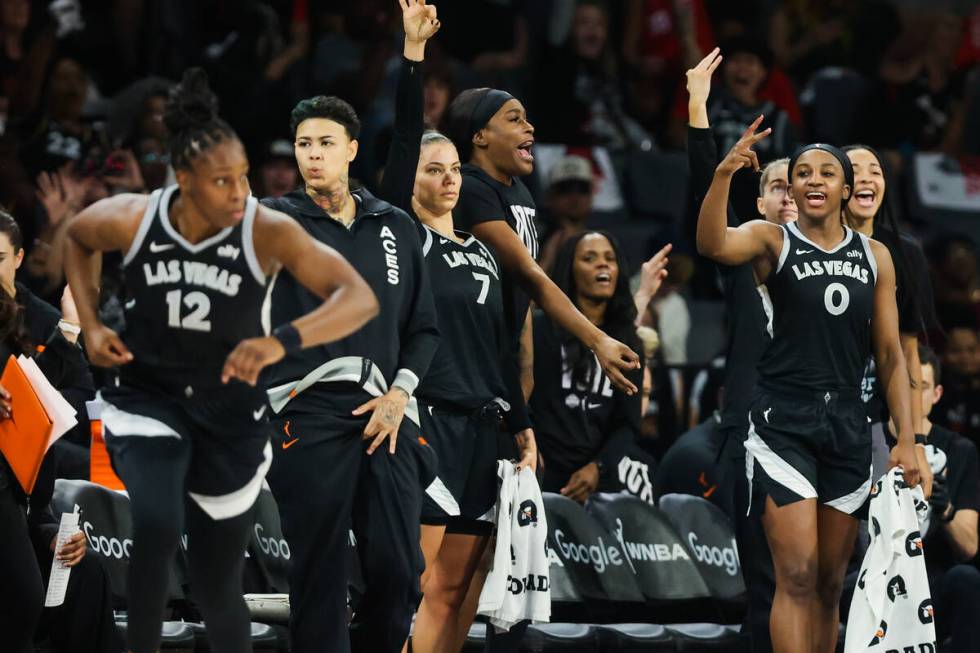 The Aces bench cheers on Aces guard Chelsea Gray (12) during the first half of game four of a W ...