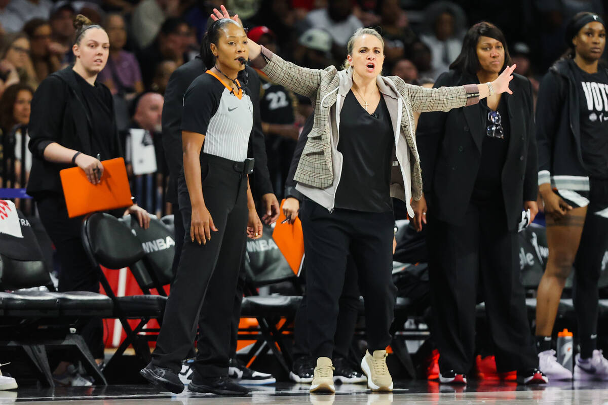 Aces head coach Becky Hammon coaches from the sidelines during the fourth quarter of game four ...