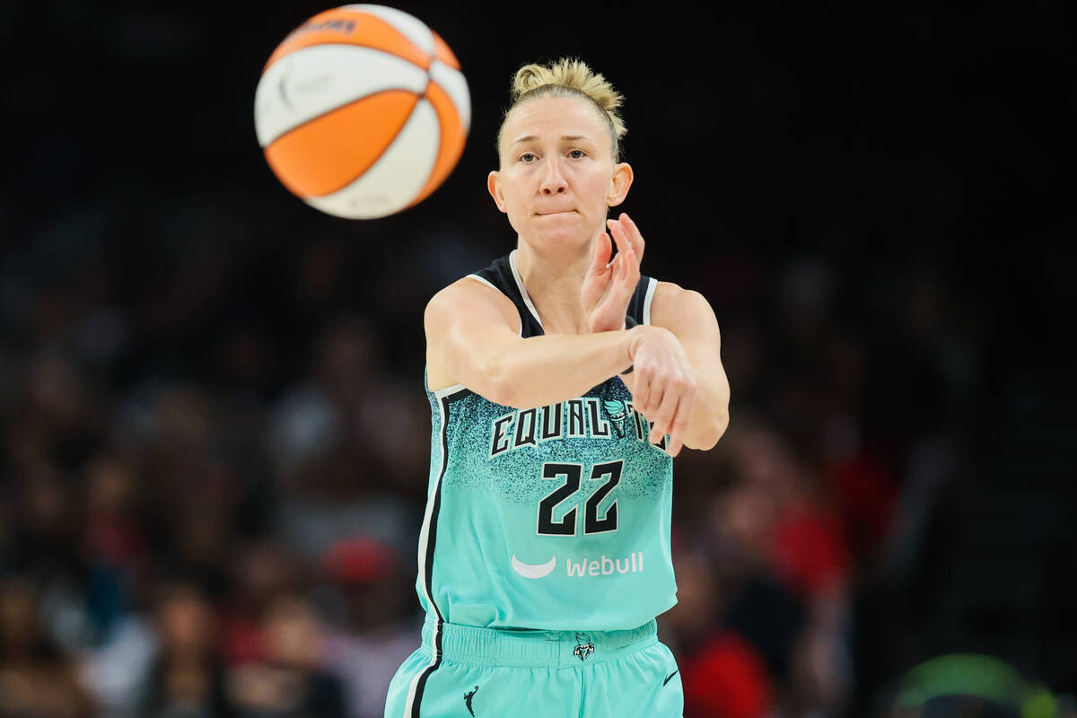 New York Liberty guard Courtney Vandersloot (22) passes the ball during game four of a WNBA sem ...