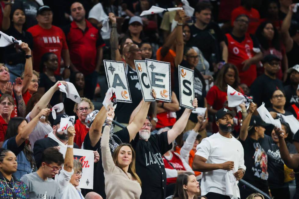 Aces fan cheer on their team during game four of a WNBA semifinals playoff series between the A ...