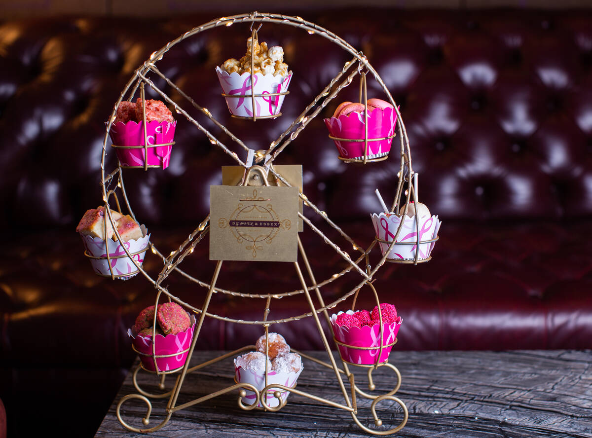 A Pink Wonder Wheel of sweets, for breast cancer awareness 2024, from Beauty & Essex in The Cos ...