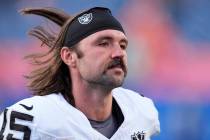 Las Vegas Raiders quarterback Gardner Minshew walks off the field after the second half of an N ...