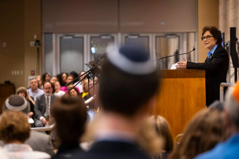 Sen. Jacky Rosen, D-Nev., speaks during a ceremony at Midbar Kodesh Temple marking one year sin ...