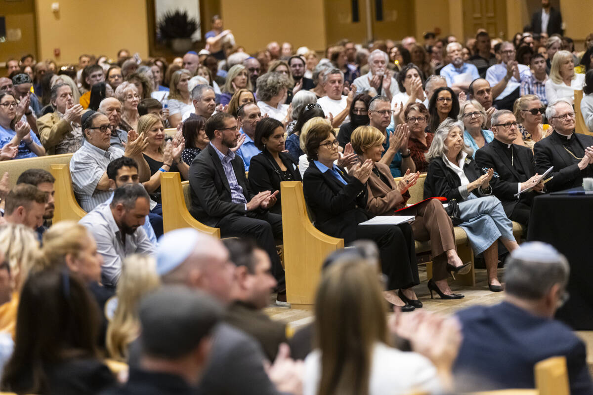 People, including Nevada officials in the front row, from left, Sen. Jacky Rosen, D-Nev., Rep. ...