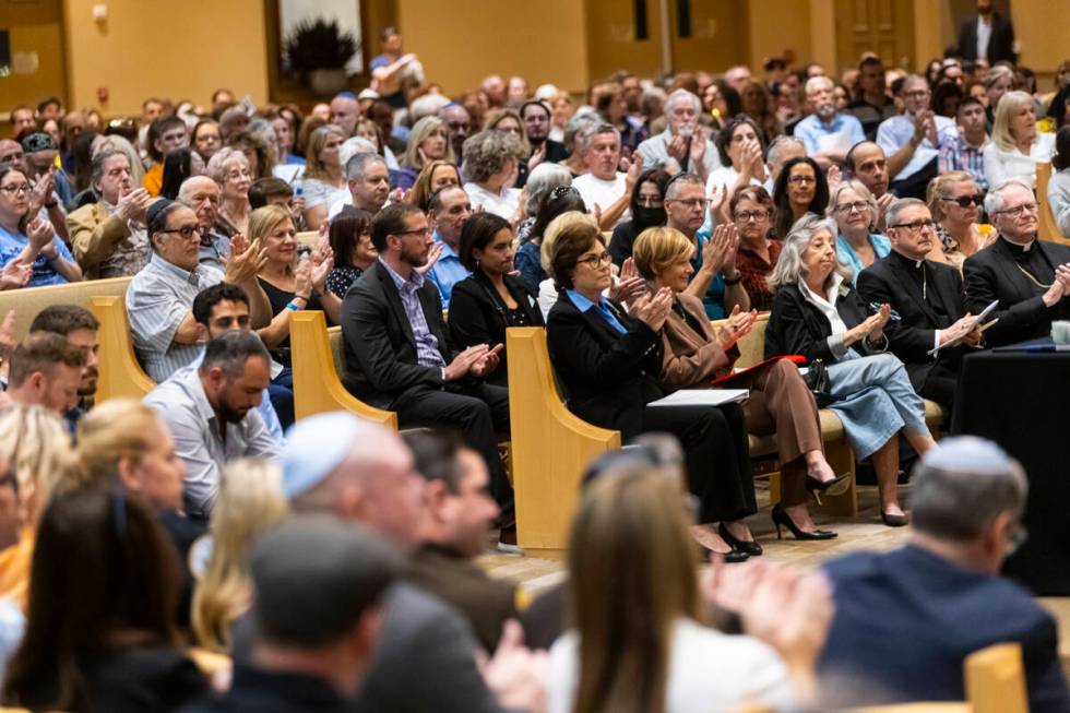 People, including Nevada officials in the front row, from left, Sen. Jacky Rosen, D-Nev., Rep. ...