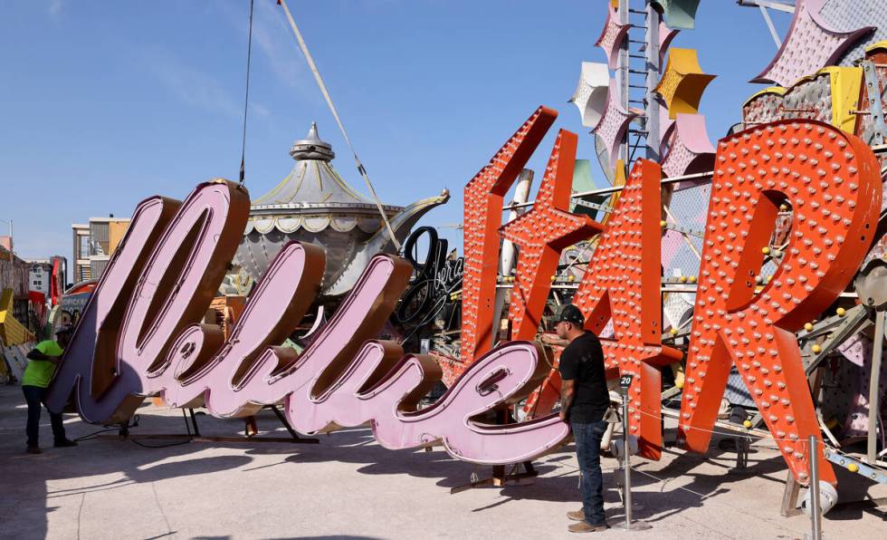 The sign from the Debbie Reynolds Hollywood Hotel is moved at the Neon Museum in Las Vegas Wedn ...